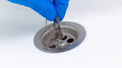 Removing hair from a clogged drain